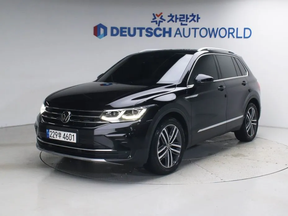 Volkswagen Tiguan — фото 1