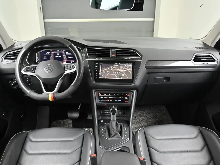 Volkswagen Tiguan — фото 10