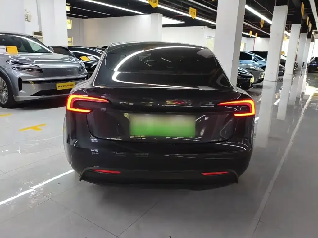 Tesla Model 3 — фото 6