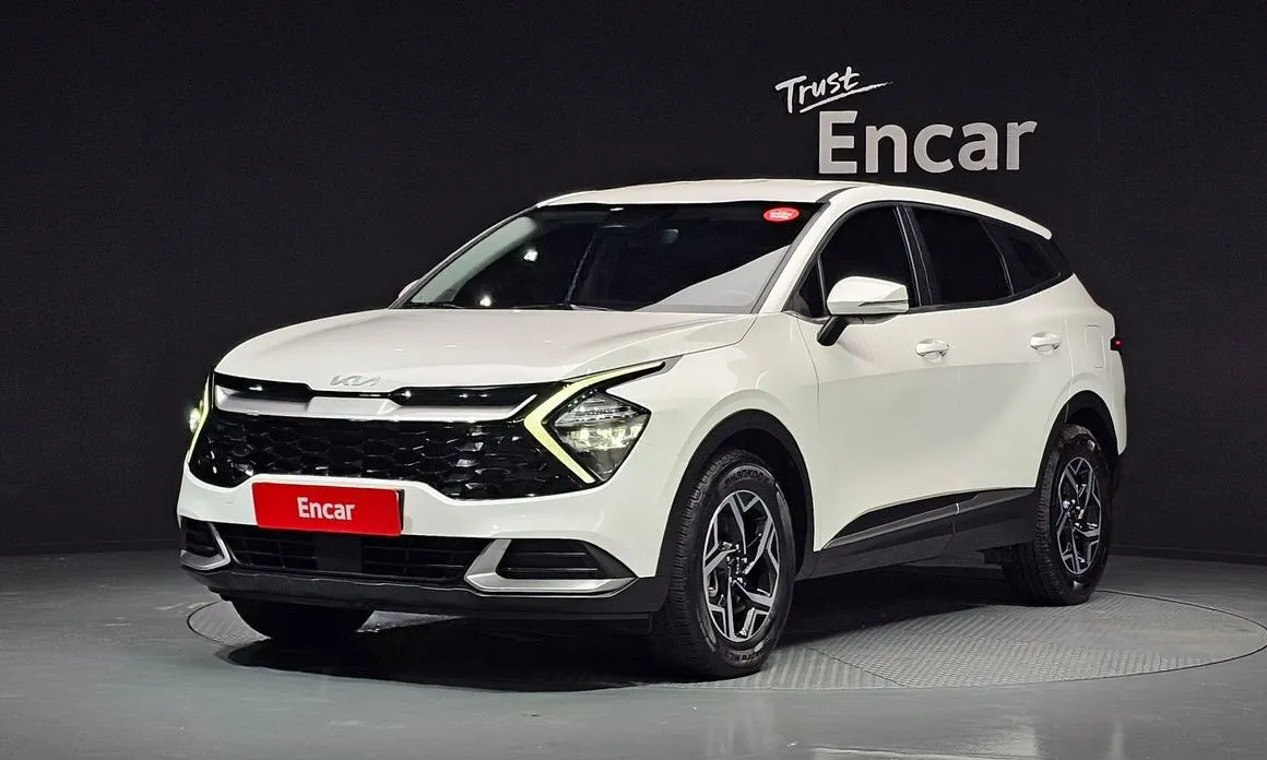 Kia Sportage — фото 1
