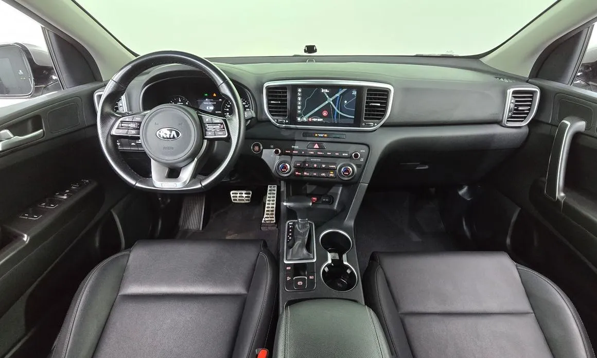 Kia Sportage — фото 9