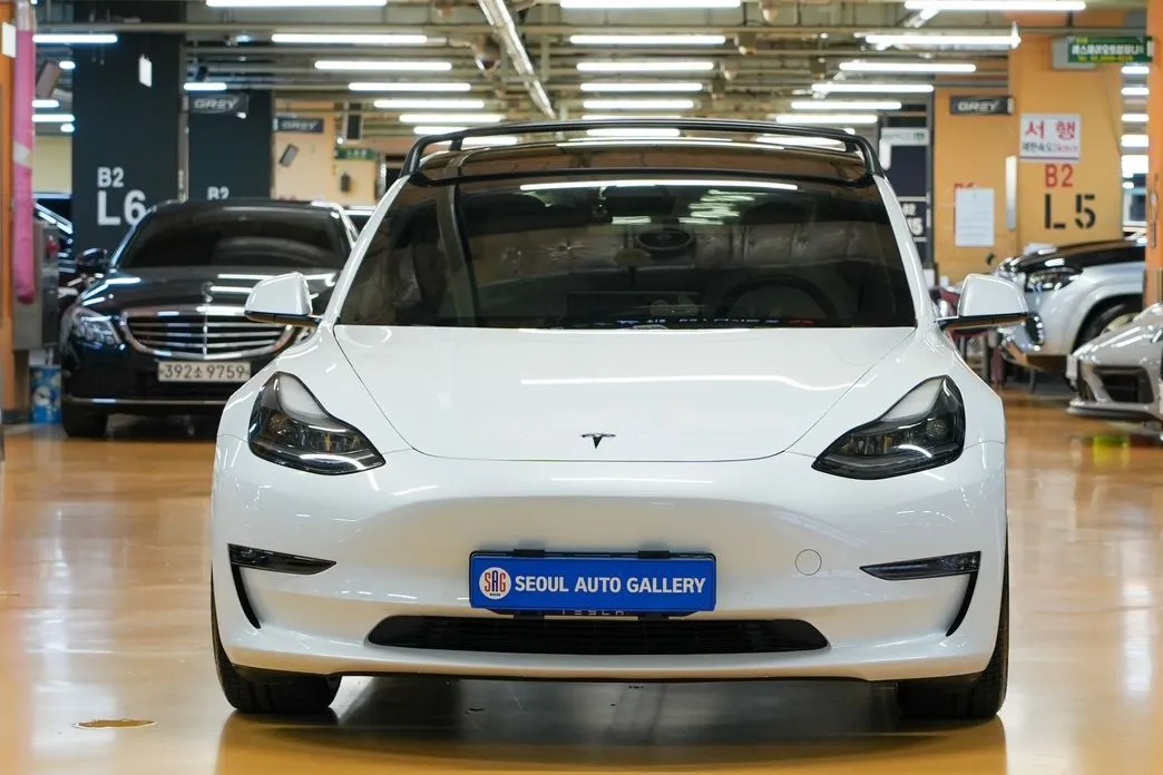 Tesla Model 3 — фото 2