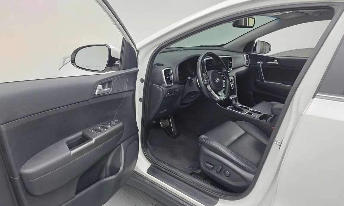 Kia Sportage — фото 7