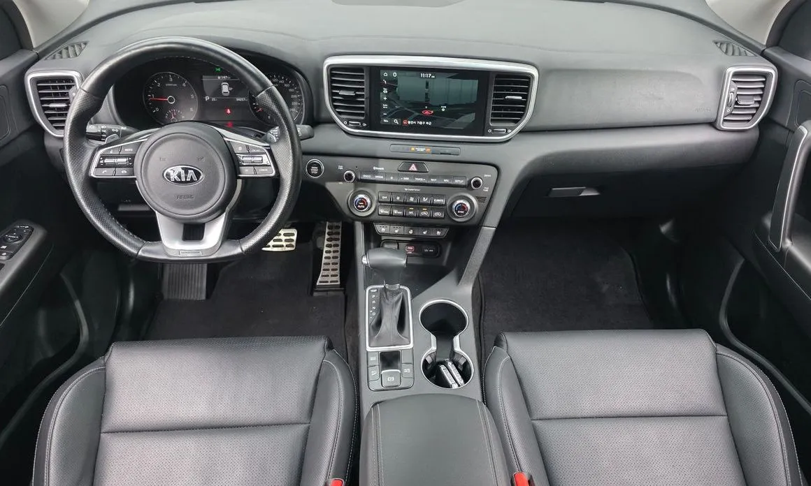 Kia Sportage — фото 10