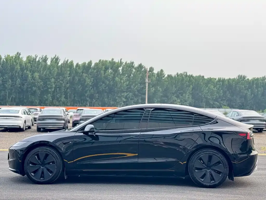 Tesla Model 3 — фото 5