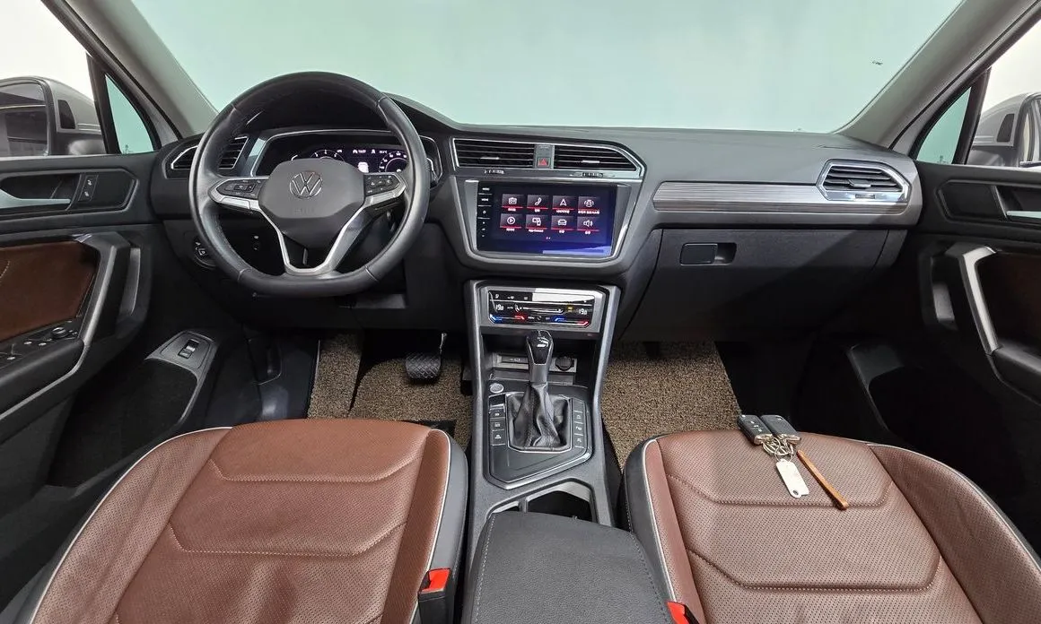 Volkswagen Tiguan — фото 10