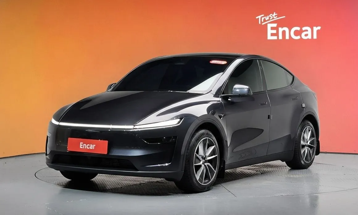 Tesla Model Y — фото 1