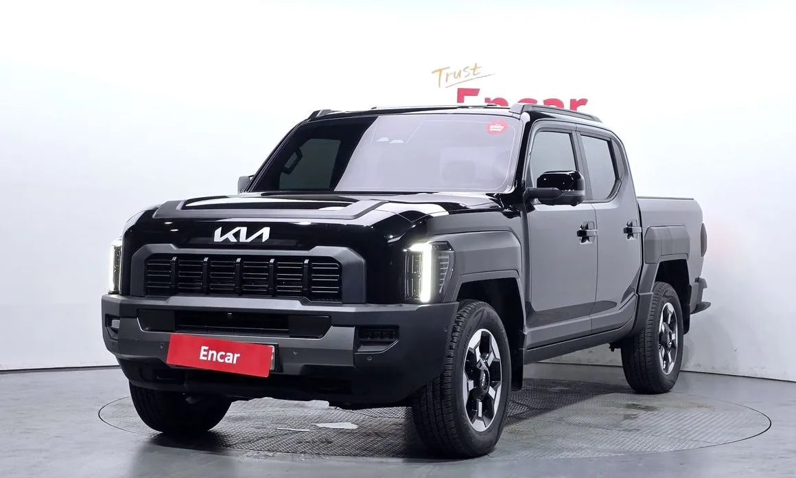 Kia Tasman — фото 1