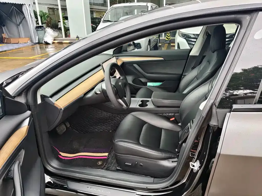 Tesla Model 3 — фото 10