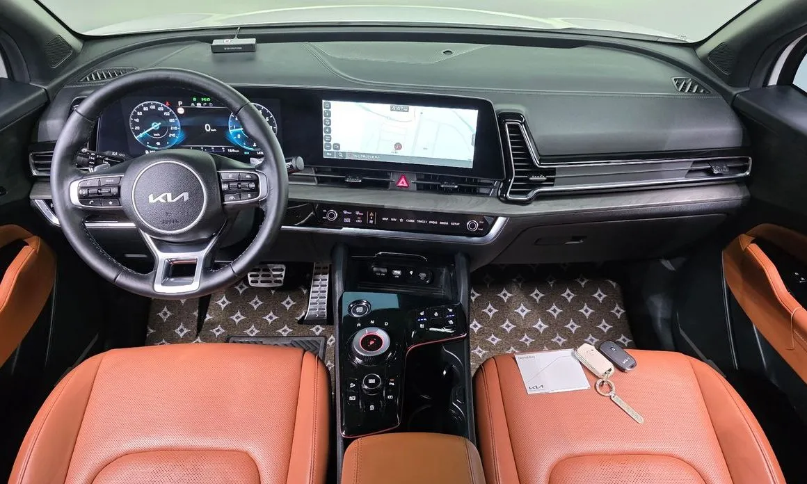 Kia Sportage — фото 9