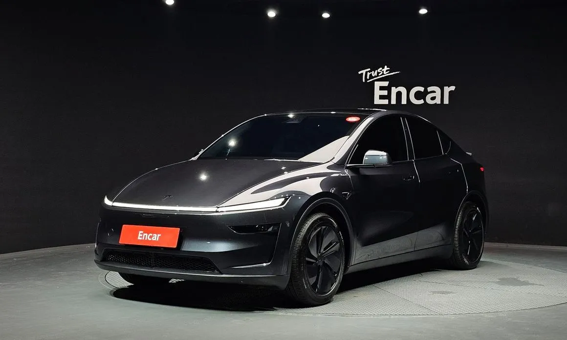 Tesla Model Y — фото 1