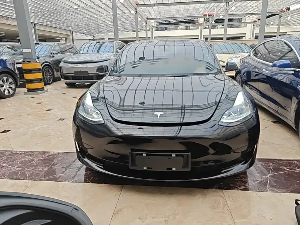 Tesla Model 3 — фото 7