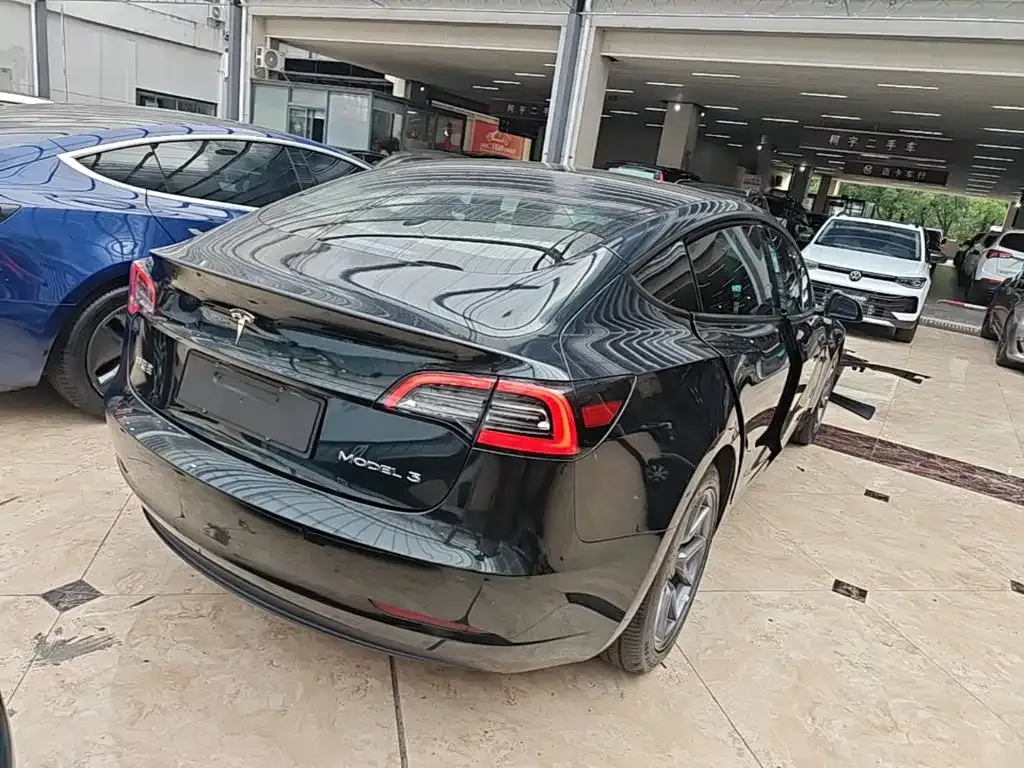 Tesla Model 3 — фото 6