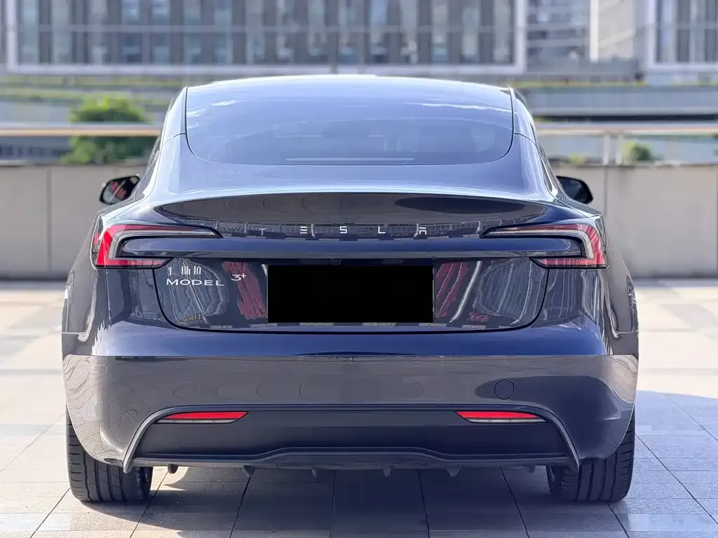 Tesla Model 3 — фото 7
