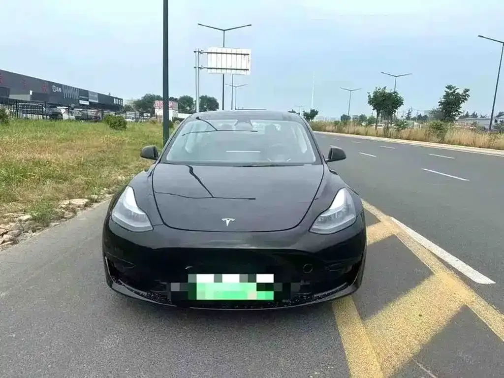 Tesla Model 3 — фото 5