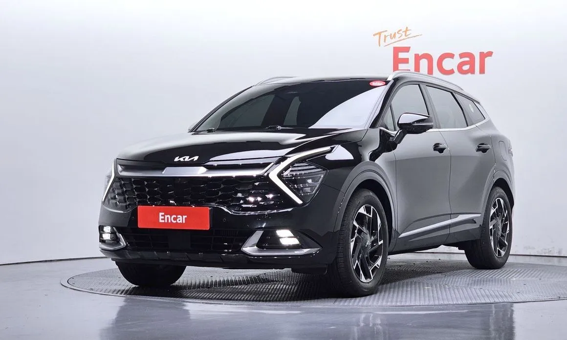Kia Sportage — фото 1