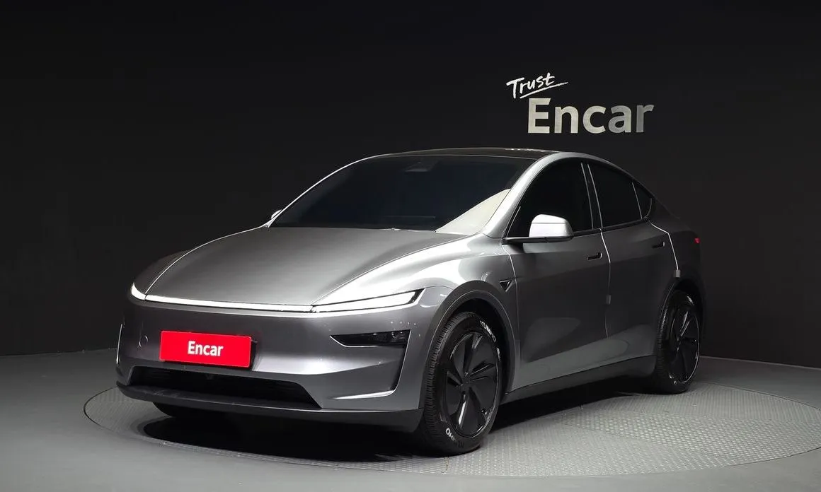 Tesla Model Y — фото 1