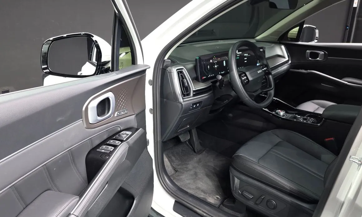 Kia Sorento — фото 7