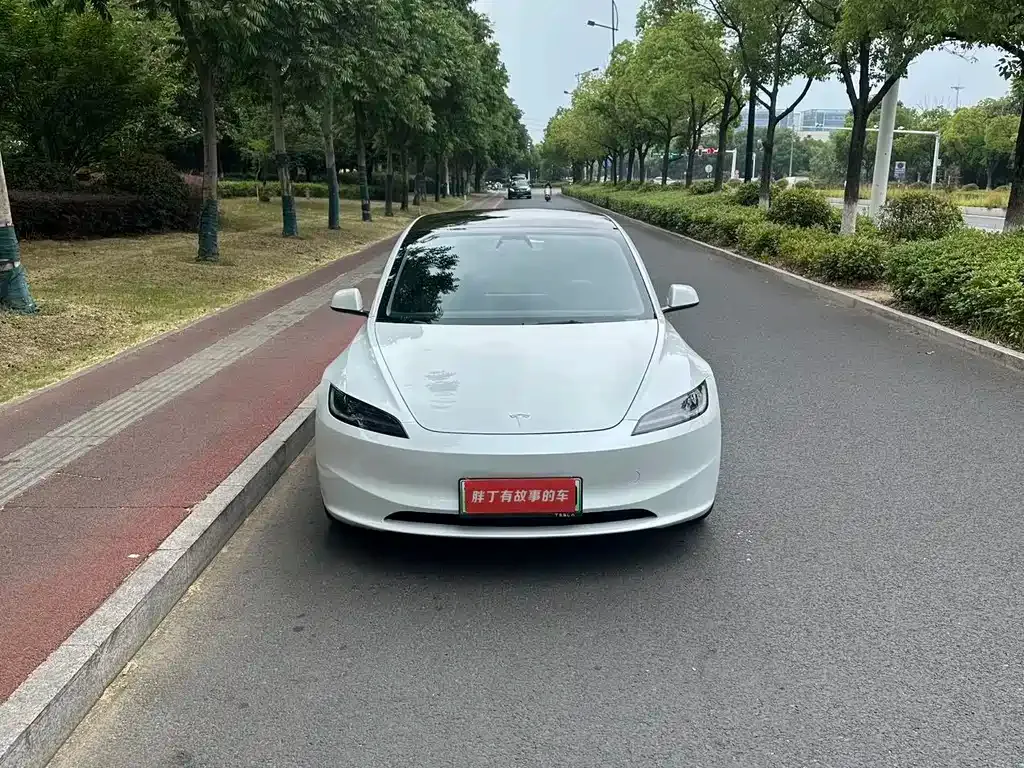 Tesla Model 3 — фото 10