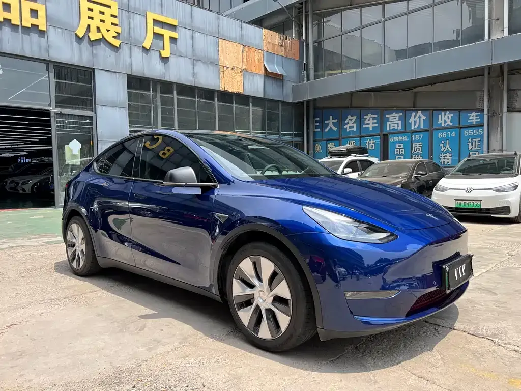 Tesla Model Y — фото 7