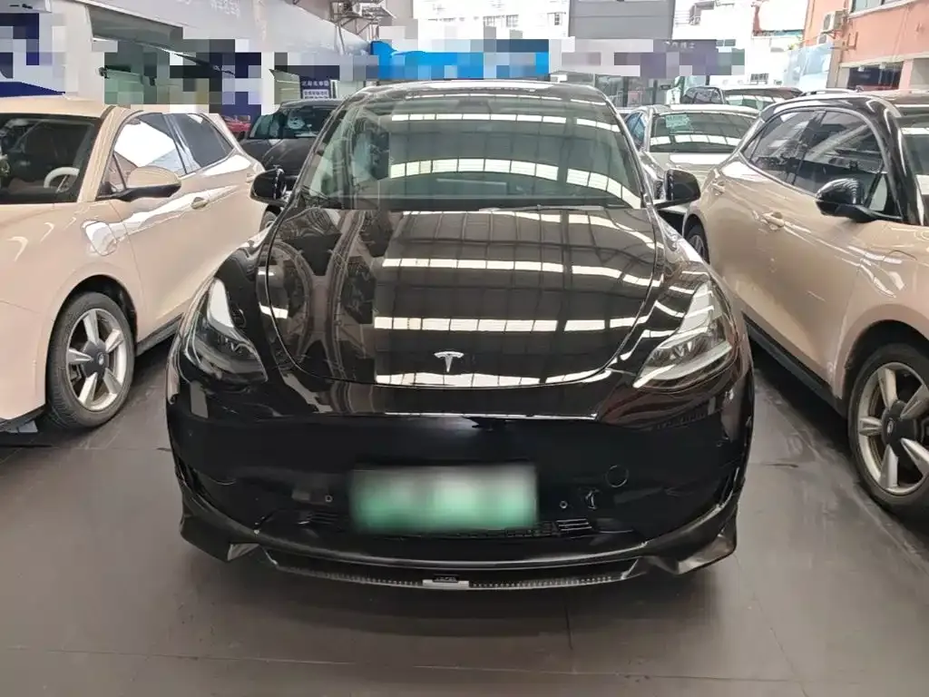 Tesla Model Y — фото 7
