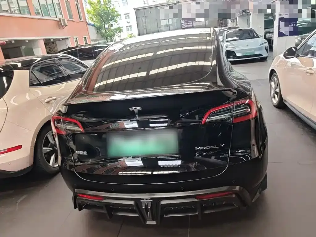 Tesla Model Y — фото 6