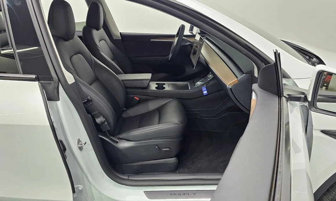 Tesla Model Y — фото 7