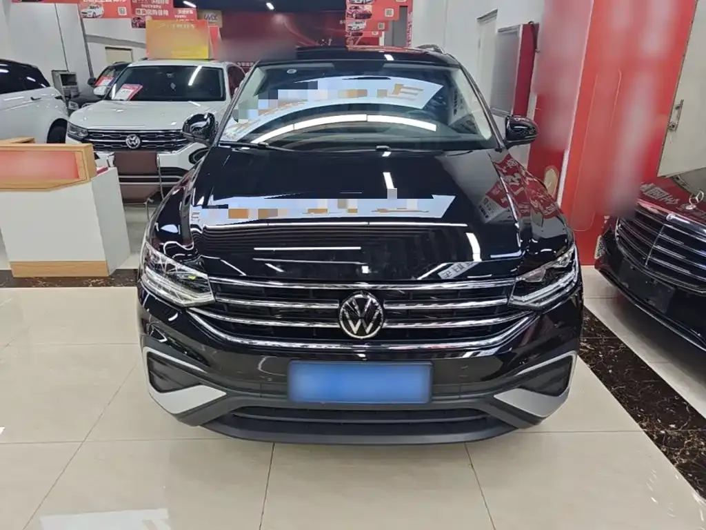 Volkswagen Tiguan L — фото 5