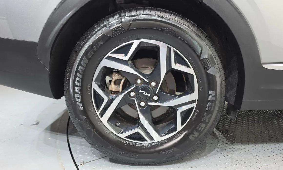 Kia Sportage — фото 9