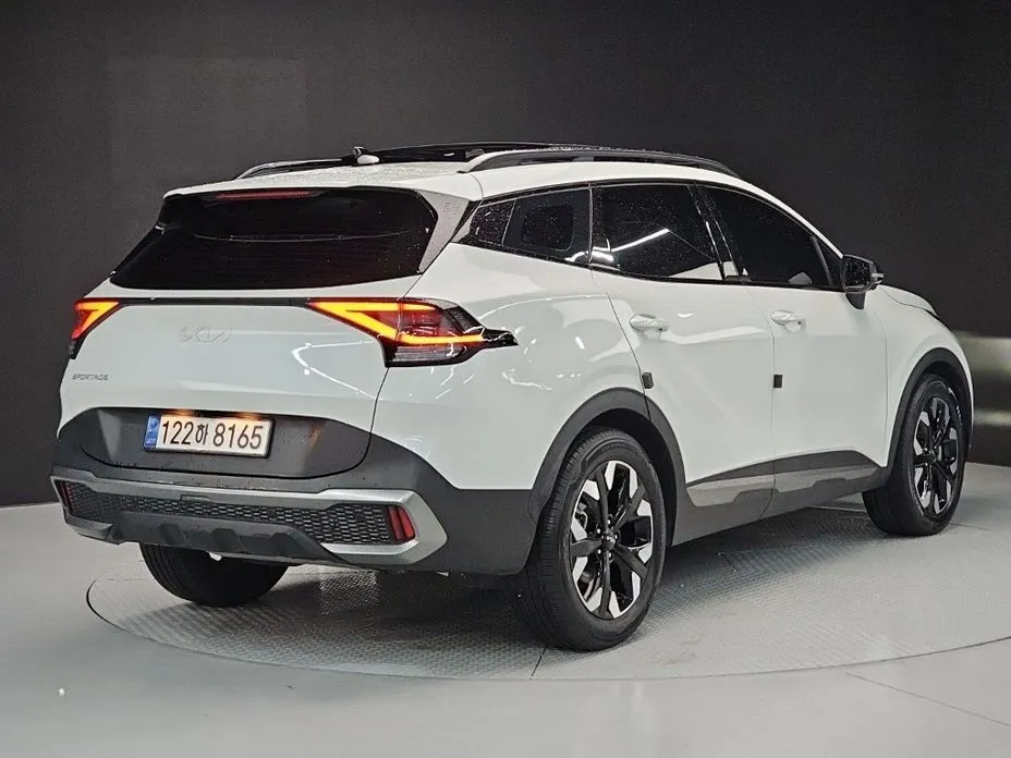 Kia Sportage — фото 7