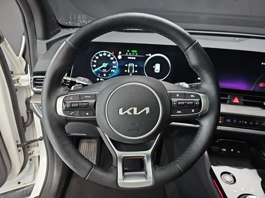 Kia Sportage — фото 6