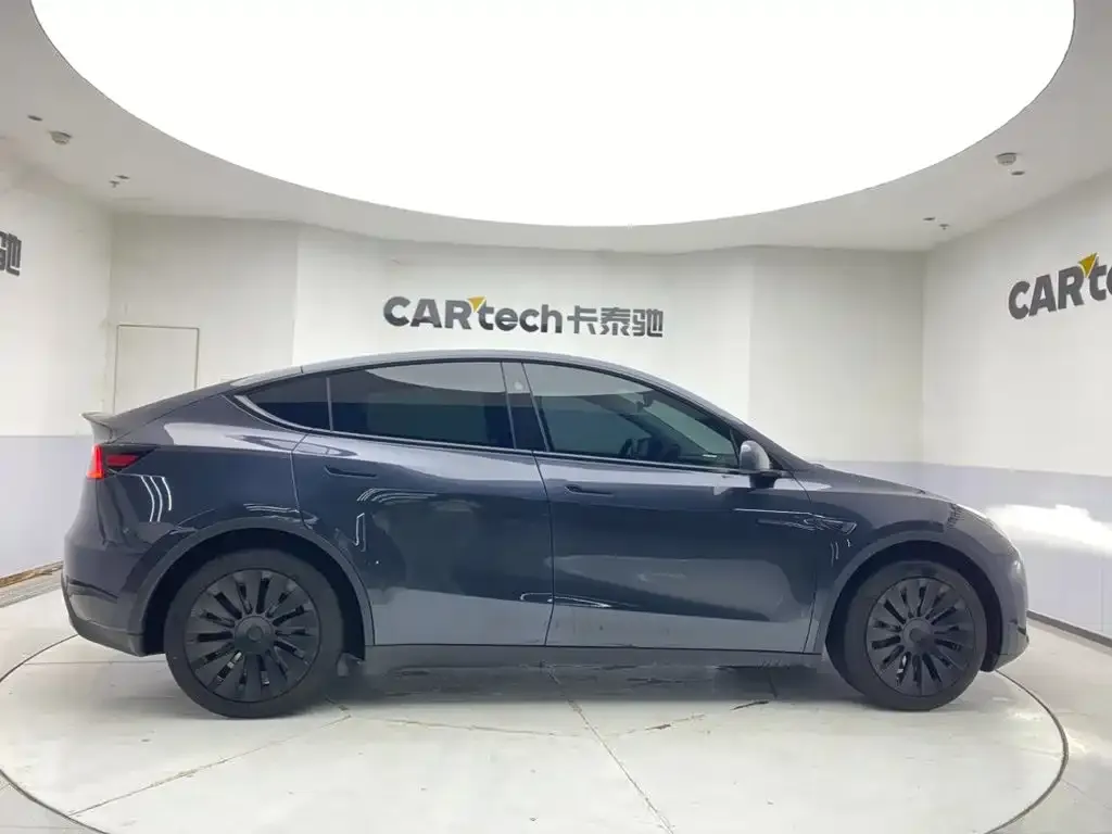 Tesla Model Y — фото 7