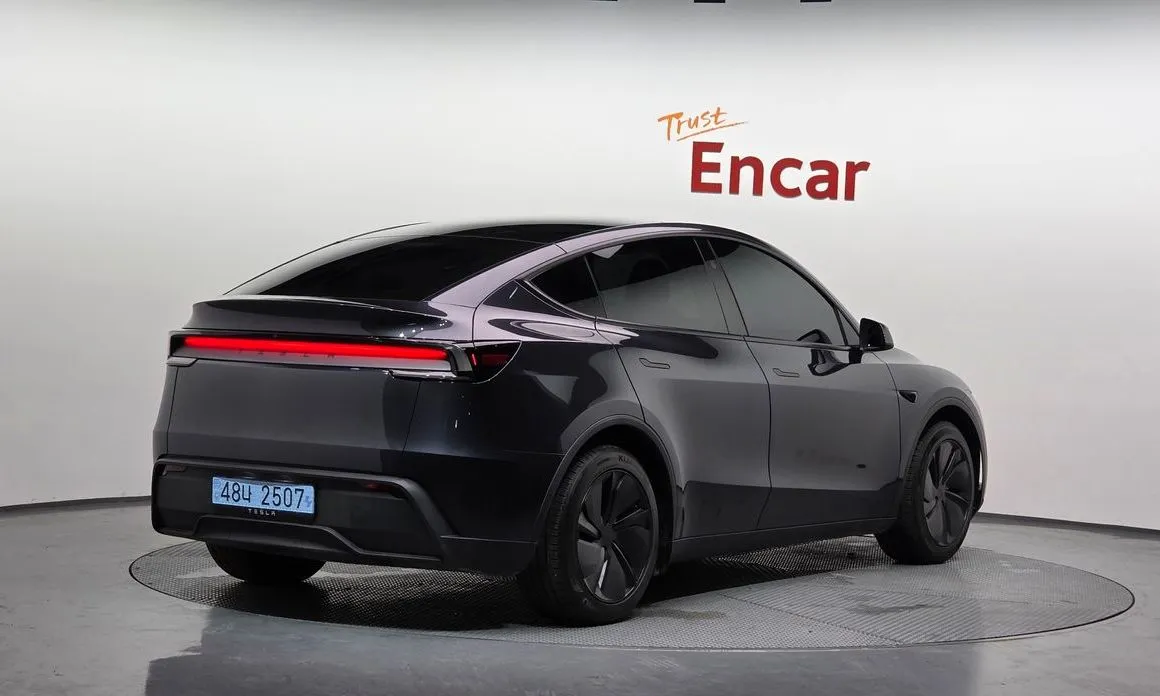 Tesla Model Y — фото 5