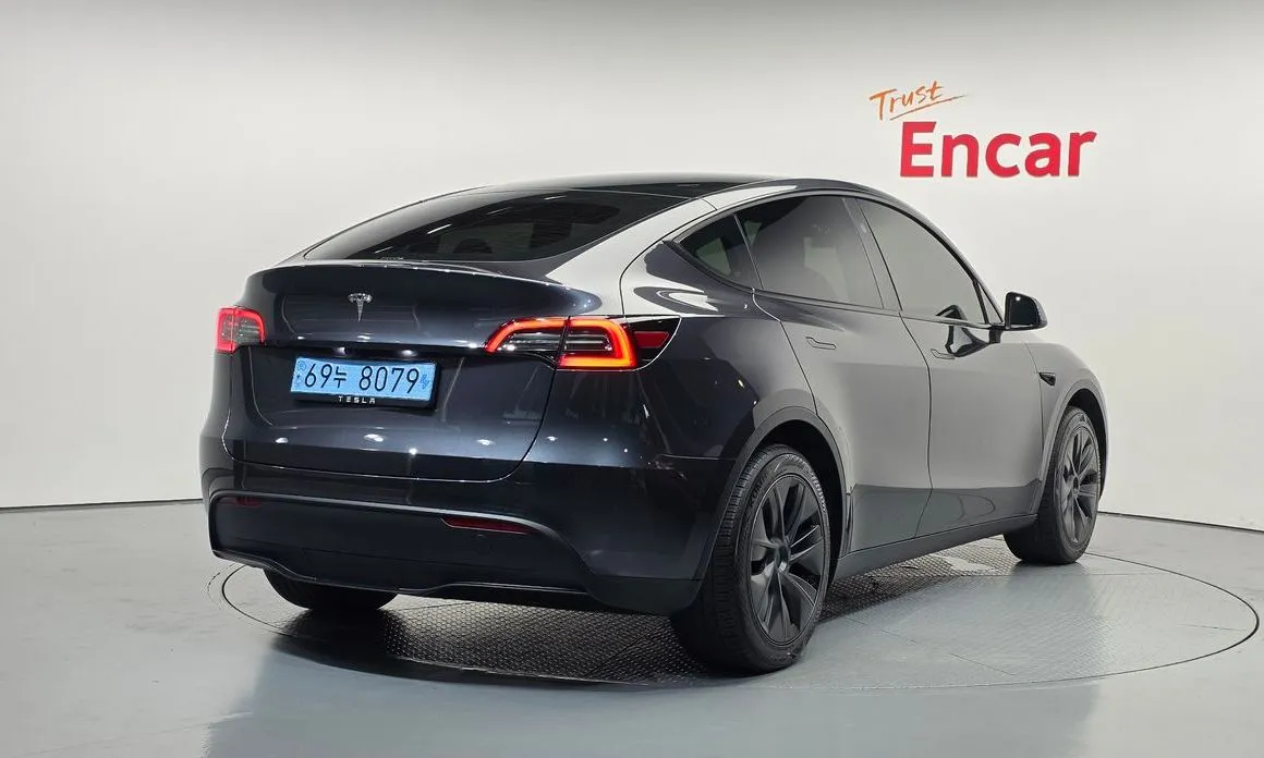 Tesla Model Y — фото 7