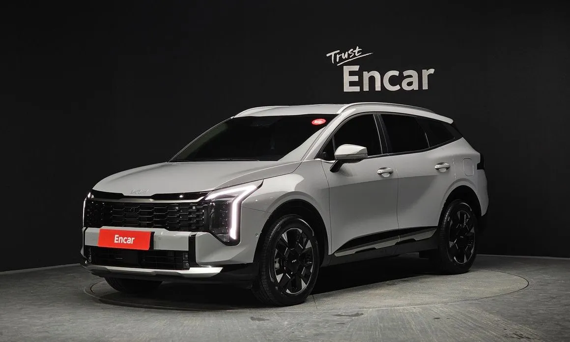 Kia Sportage — фото 1