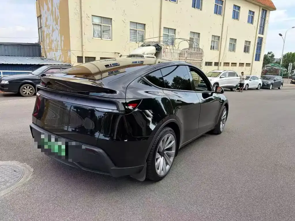 Tesla Model Y — фото 7