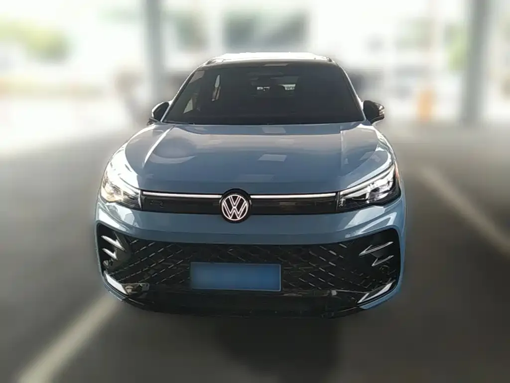 Volkswagen Tiguan L — фото 5