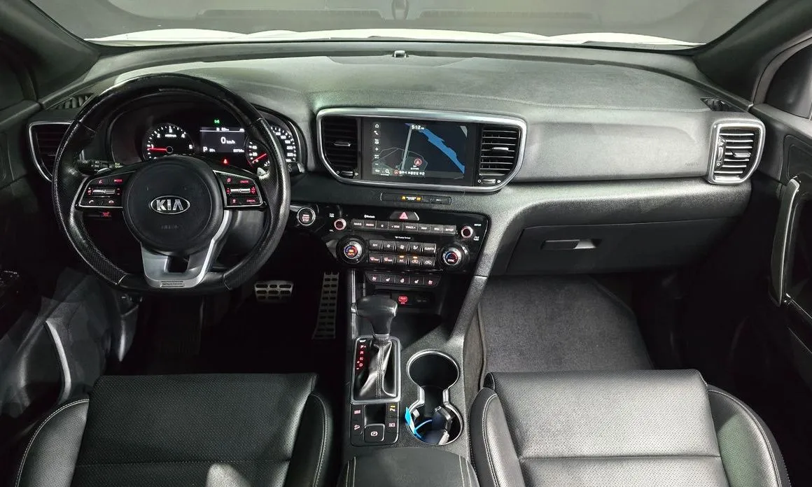 Kia Sportage — фото 10