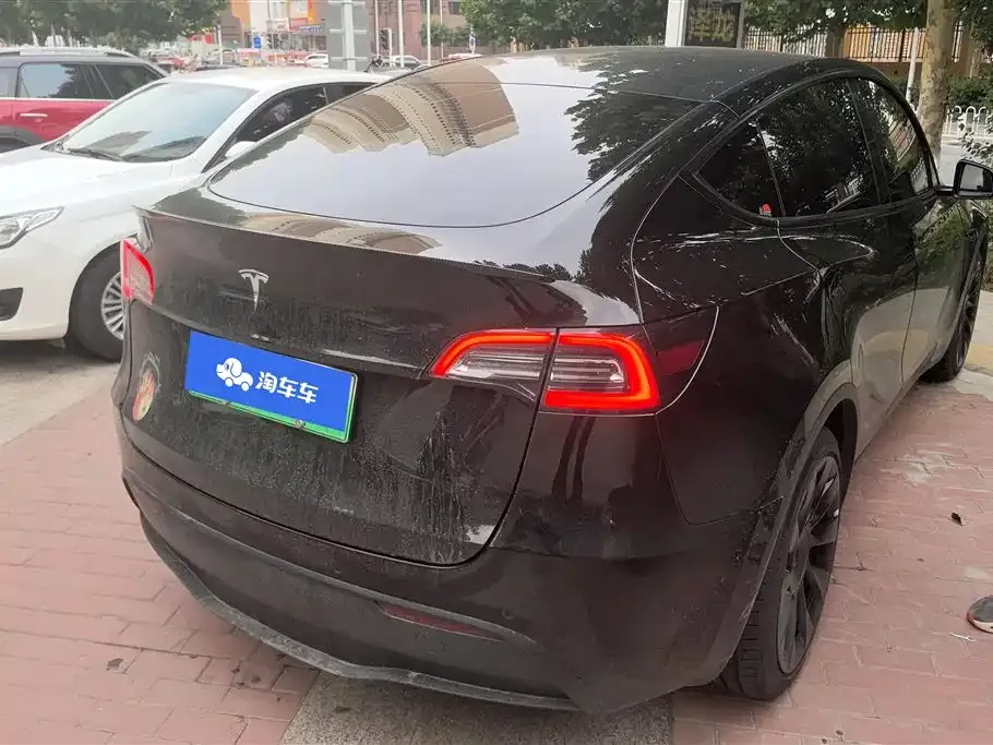 Tesla Model Y — фото 9