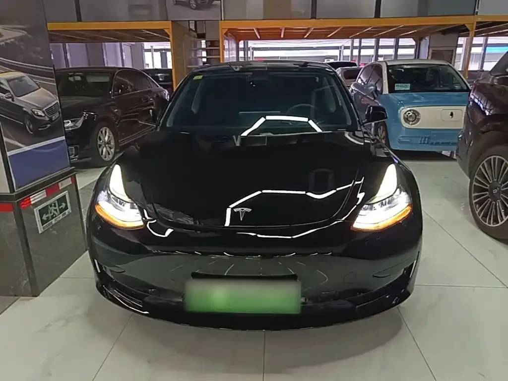 Tesla Model 3 — фото 7
