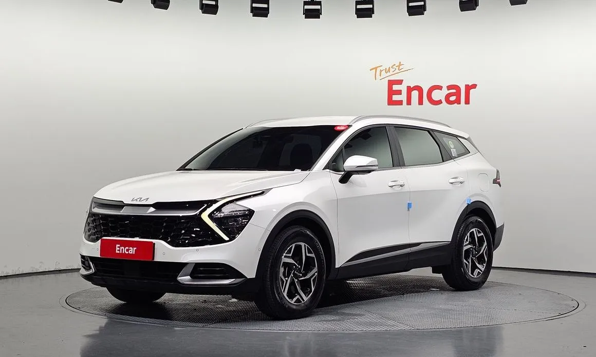 Kia Sportage — фото 1