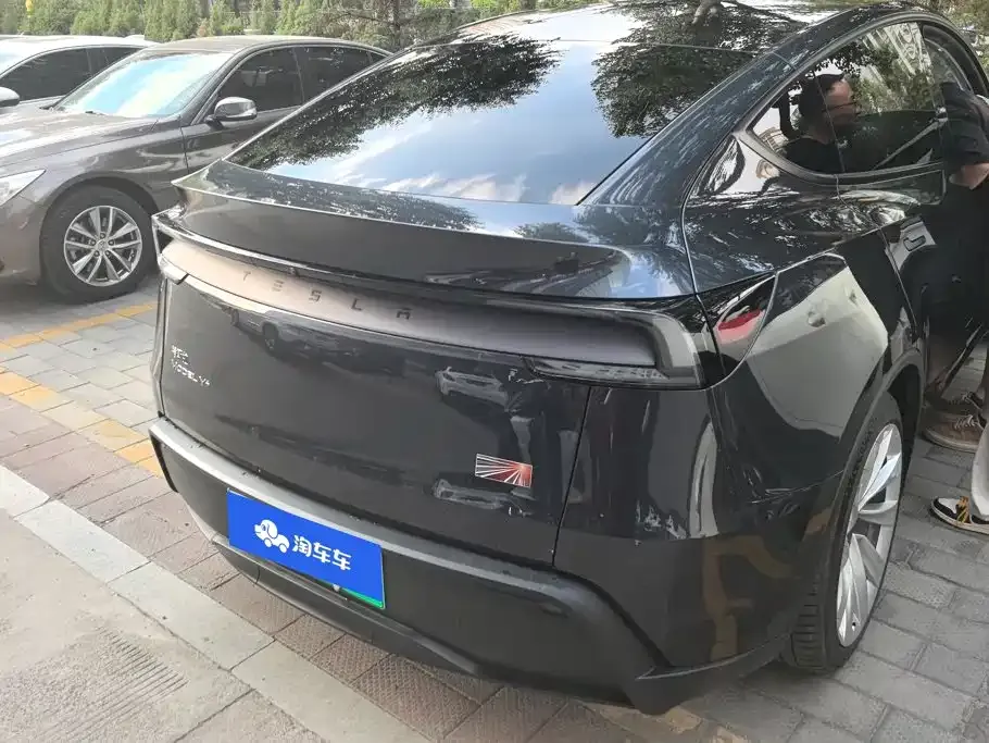 Tesla Model Y — фото 8