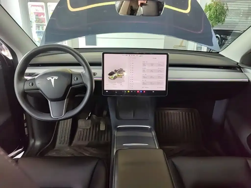 Tesla Model Y — фото 6