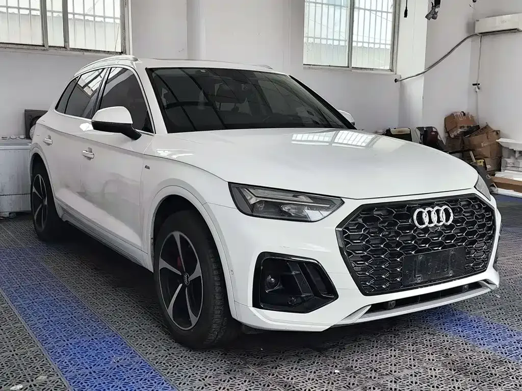 Audi Q5L — фото 10