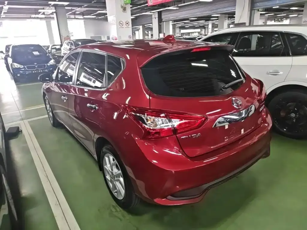 Nissan Tiida — фото 9