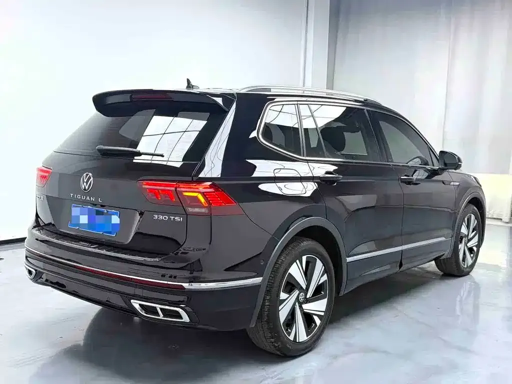 Volkswagen Tiguan L — фото 7