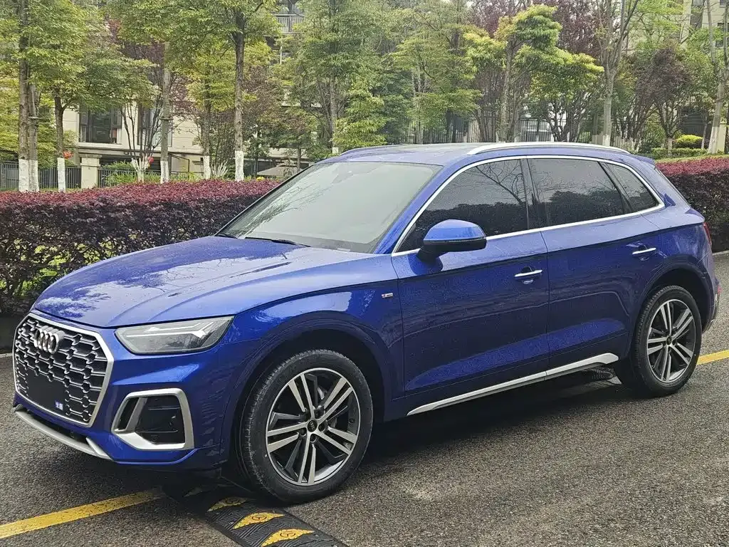 Audi Q5L — фото 10