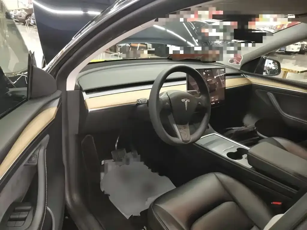 Tesla Model Y — фото 6