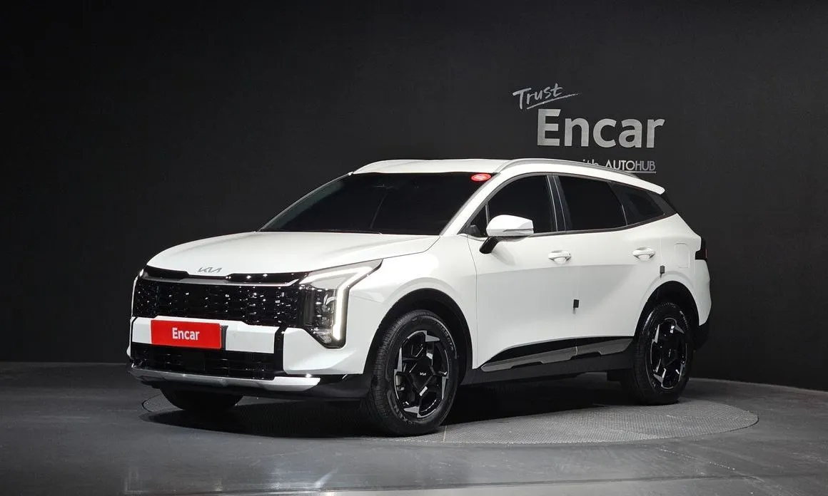 Kia Sportage — фото 1