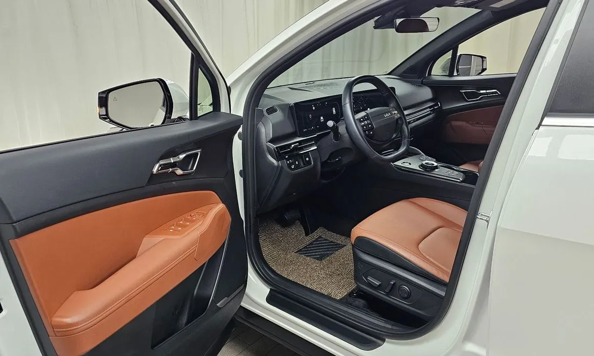 Kia Sportage — фото 9